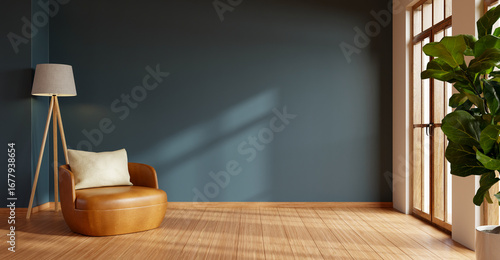 A stylish and minimalist living room with a rich dark blue wall, a comfortable tan leather armchair, and ample copy space- 3D rendering