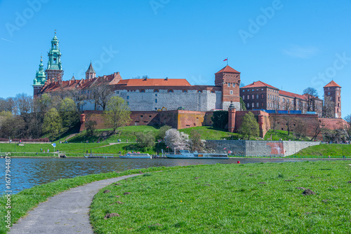 фотографія Wawel castle in the polish city Krakow/Cracow reflected on the V