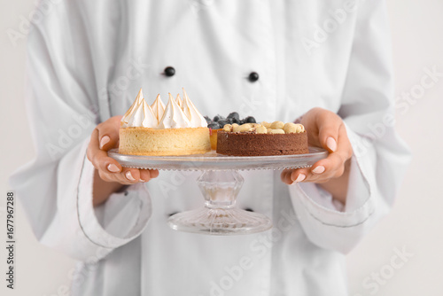 Female confectioner with ta...