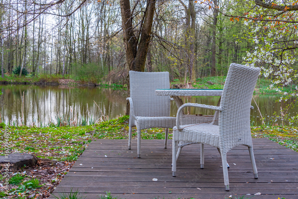 Obraz premium Outdoor seating at Pszczyna castle park in Poland