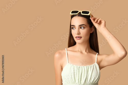Beautiful young woman with ...