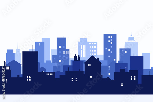 Vibrant cityscape silhouette at dusk with glowing windows, capturing urban energy and modern living.