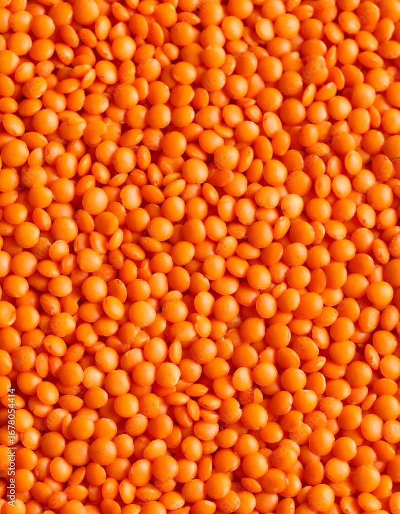 Fototapeta premium Close-up view of many orange lentils