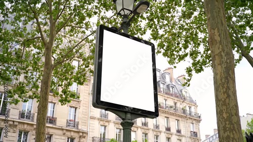 Blank White Square Sign on a Parisian Street Lamp