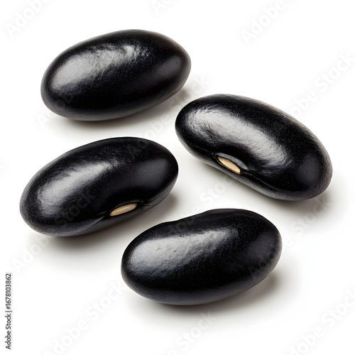 A detailed image of raw black beans isolated on a clean white background, highlighting their smooth texture,