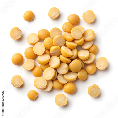Close-up of split pigeon peas isolated on a white background, showing their flat, yellow halves