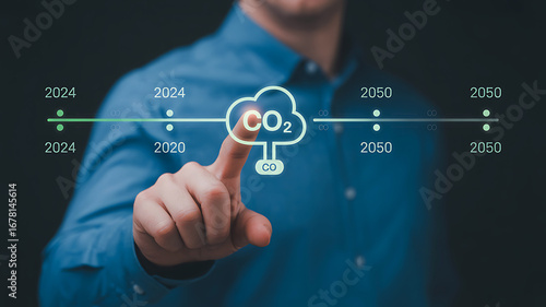 Person's finger interacts with digital co2 cloud icon on futuristic timeline interface