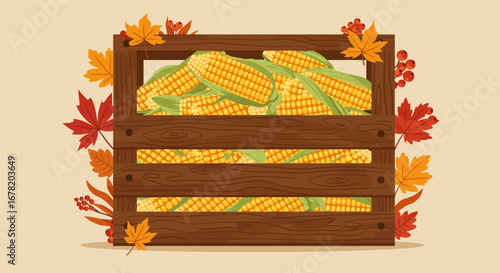 Wooden crate filled with corn cobs surrounded by colorful fall leaves