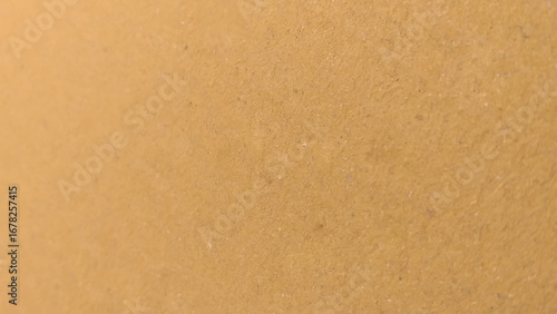 Background of brown kraft paper or cardboard texture. Brown recycled paper texture background.