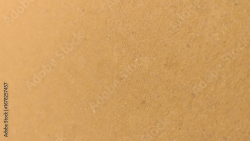 Background of brown kraft paper or cardboard texture. Brown recycled paper texture background.