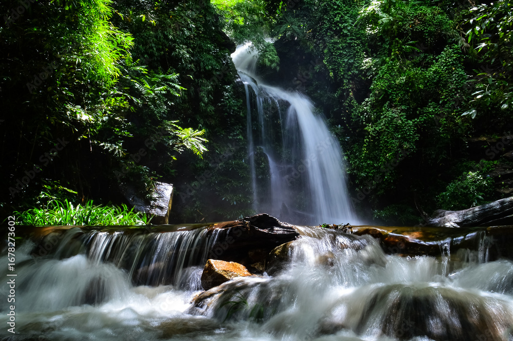 Obraz premium Mon Tha Than Waterfall or Montha Than Waterfall in the rainy season at Doi Suthep-Pui National Park,Chiang mai, Northern Thailand.