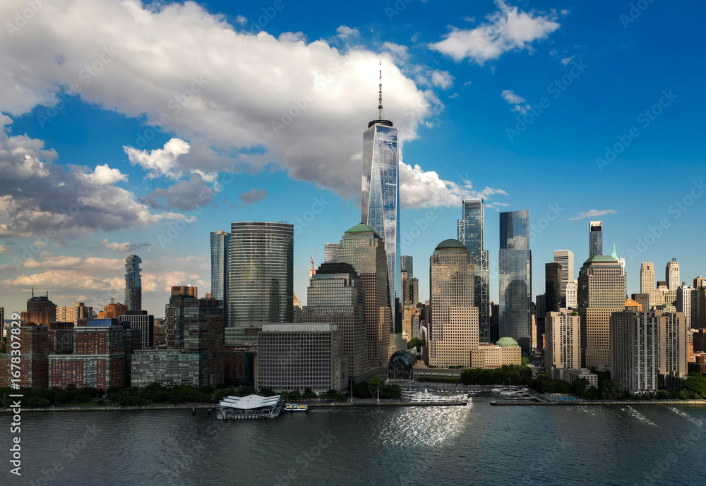 Obraz premium New York skyline with skyscrapers aerial view. Manhattan and Brooklyn on sky. New York City skyline with Hudson River. Downtown NYC. New York waterfront skyline. Panorama of of New York from top.