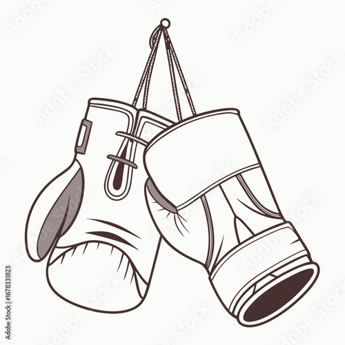 Pair of boxing gloves hanging by laces on a white background representing combat sports