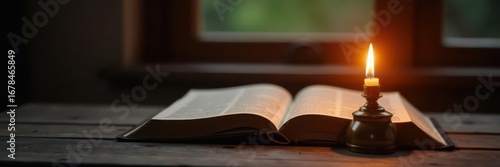 Oil lamp glows, Bible softly blurred, dark wood table , reading, spiritual