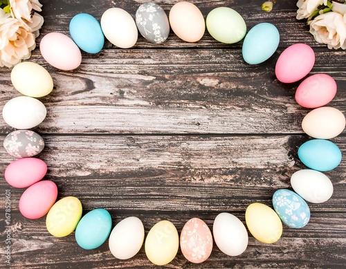 Pastel Easter eggs in a circle on wood