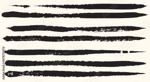 Collection of hand-painted black brush strokes on white background, varying in length and texture.