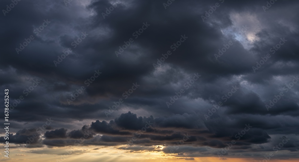 Obraz premium Dark storm clouds atmospheric background for commercial use