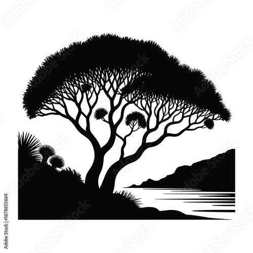 Silhouette of a majestic acacia tree by a tranquil river at dusk