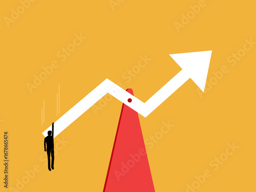 businessman weighs the graph upwards