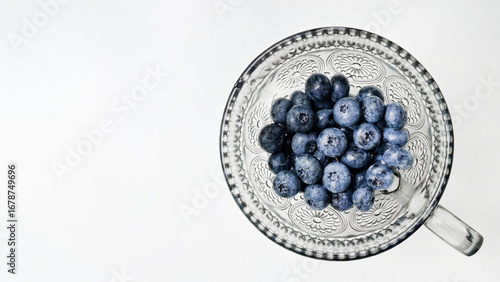 Εκτύπωση καμβά Intricate crystal bowl cradles plump blueberries, evoking Midsummer's Eve feasts