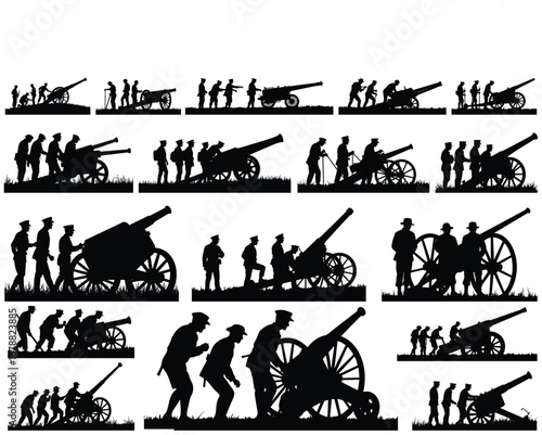 Soldiers operating artillery gun in silhouette cannon