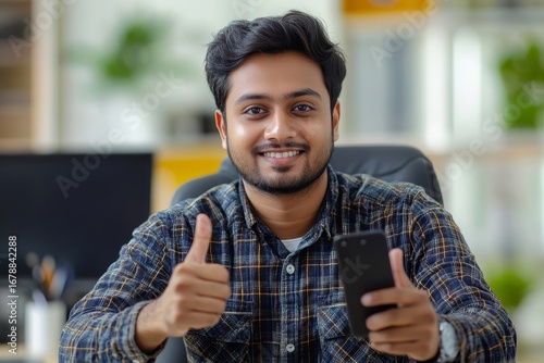 Portrait of a young Indian doctor sitting at a table in a hospital, wearing a virtual mask, portraying the professional care and focus of a healthcare worker in a medical setting, Generative AI