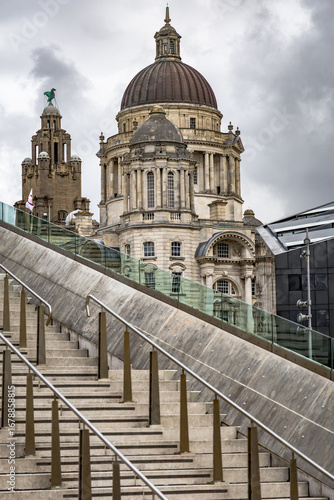 Looking across the steps of the Museum of Liverpool towards the Port of Liverpool building, with the Royal Liver Building and one of the two Liver Birds, Bertie, visible in the background.