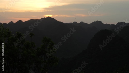 Wallpaper Mural Silhouette of Cat Ba National Park’s rugged limestone peaks at sunset, Vietnam. Torontodigital.ca