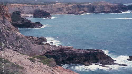 Sea Cliffs Of Praia do Amado On The Algarve Coast In Portugal. Static Shot