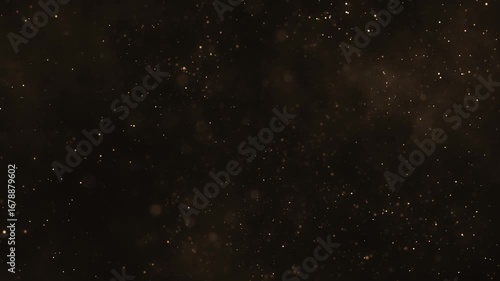 Luxury background with glittering shiny gold particles and shimmering bokeh light. Elegant golden background ideal for glamorous events, award ceremonies or talent shows. 