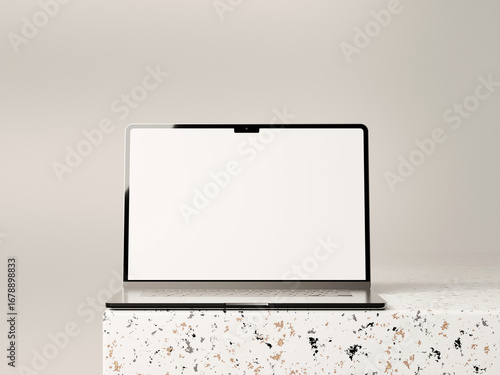 Laptop mockup with clean screen on a white surface, showcasing minimalist design.