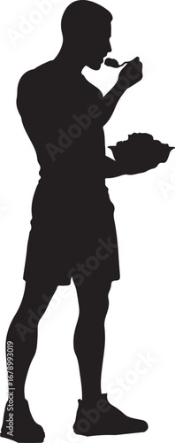 The image is a black silhouette of a person wearing shorts and sneakers, standing and eating from a plate with a spoon in their hand.