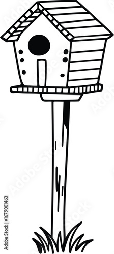 Birdhouse on a pole with grass wooden shelter