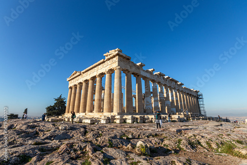 Athens, Greece. The Parthenon on the Acropolis, built between 447 and 432 BC under Pericles, dedicated to Athena Parthenos, shining under a warm blue sky