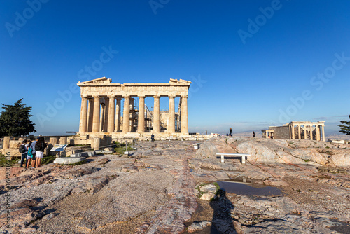 Athens, Greece. The Parthenon on the Acropolis, built between 447 and 432 BC under Pericles, dedicated to Athena Parthenos, shining under a warm blue sky