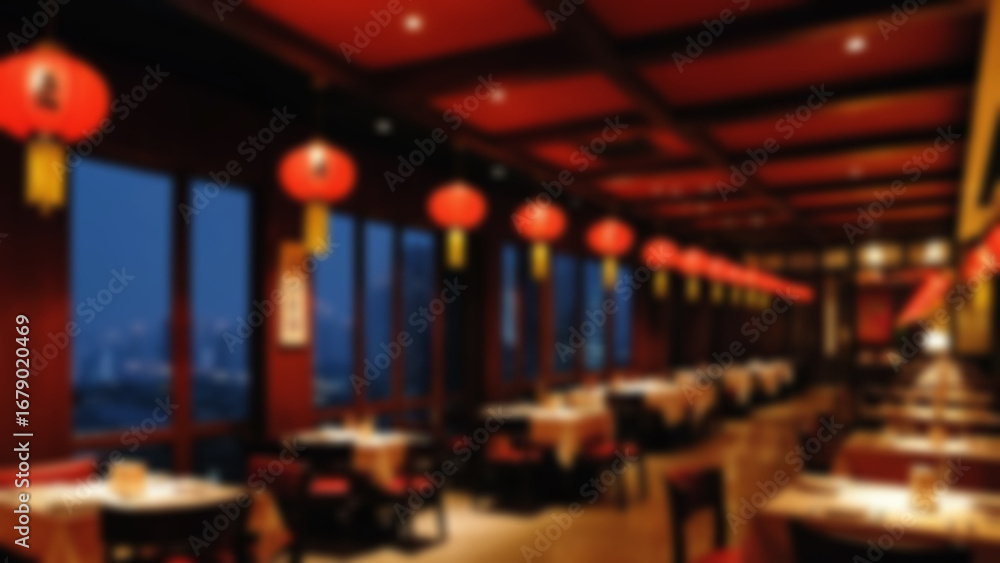 Fototapeta premium Blurry photo of the interior of a Chinese restaurant at night with typical Chinese lamps hanging from the restaurant roof, blurry wallpaper.