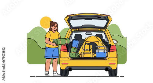 Young woman packing camping gear into a car for an outdoor adventure trip, camping concept