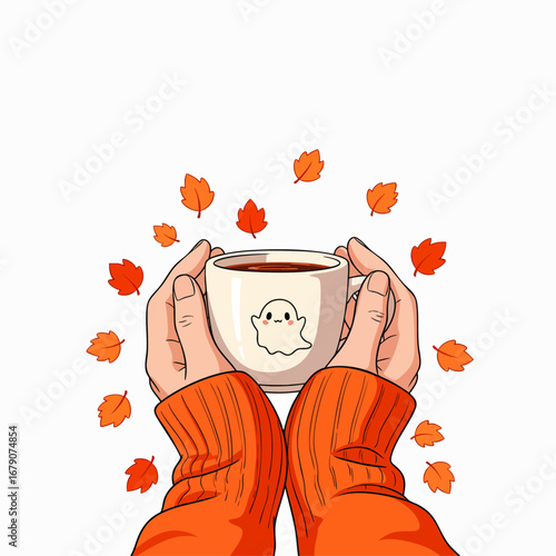 Cozy hands in a warm orange sweater hold a charming mug with a friendly ghost, surrounded by vibrant autumn leaves, perfect for a comforting fall season.