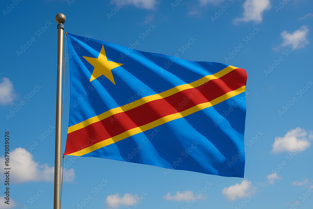 Fototapeta premium DR Congo flag waving in the bright blue sky.