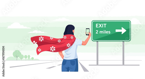Woman Wearing Cape Points Smartphone And Approaches Highway Exit Sign 2 Miles Away