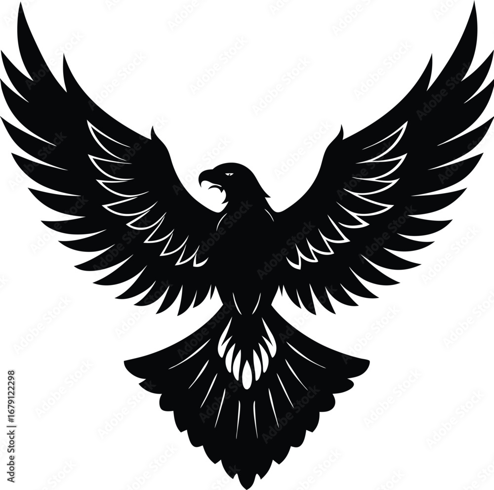 Obraz premium Majestic flying eagle silhouette with outstretched wings in dynamic pose