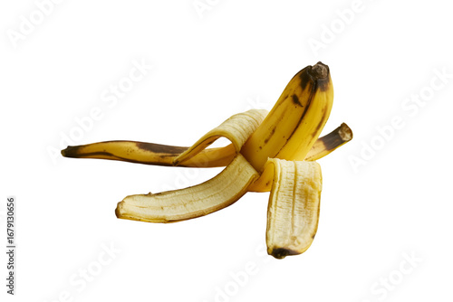 Peeled ripe banana with brown spots isolated on transparent background