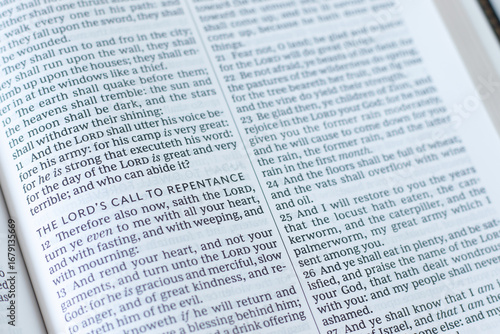 Lord's call to repentance text in open holy bible book. Christian biblical concept of God's mercy, grace and restoration.