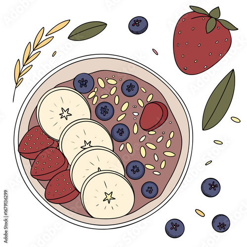 Delicious overhead view of a healthy breakfast bowl filled with oatmeal topped with fresh strawberries blueberries and banana slices