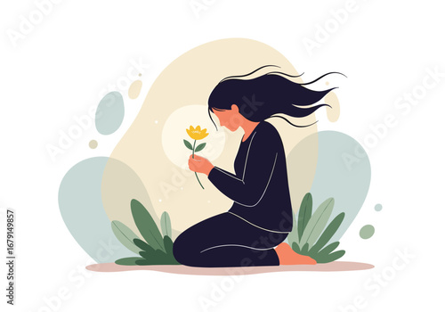 A solitary woman kneels in nature holding a yellow flower gently
