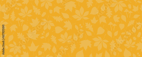 Seamless pattern with autumn leaves, acorns, berries and mushrooms on yellow background. Repeated seasonal texture. Autumn season and thanksgiving celebration banner