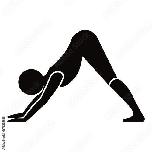 Silhouette of a person performing the downward-facing dog yoga pose symbolizing fitness and well-being