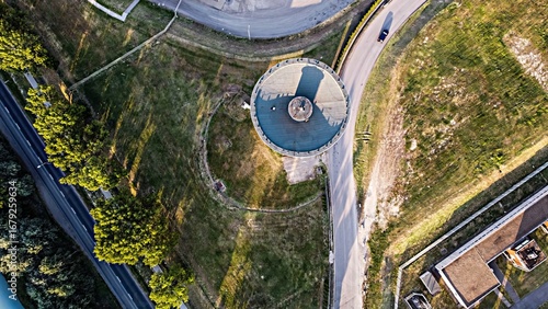 Obraz na plátně Circular Tower at Road Intersection