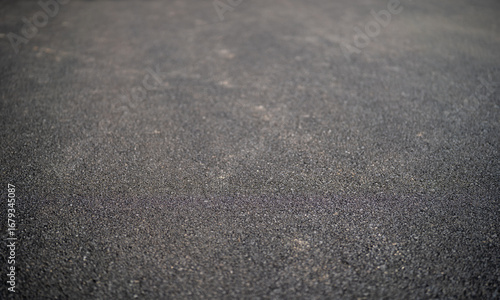 Wallpaper Mural Close-up of a textured asphalt surface showcasing dark gray tones. Torontodigital.ca