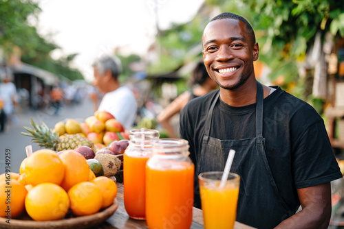 A Smiling Juice Vendor Posing with Fresh Fruit and Refreshing Juice at a Market